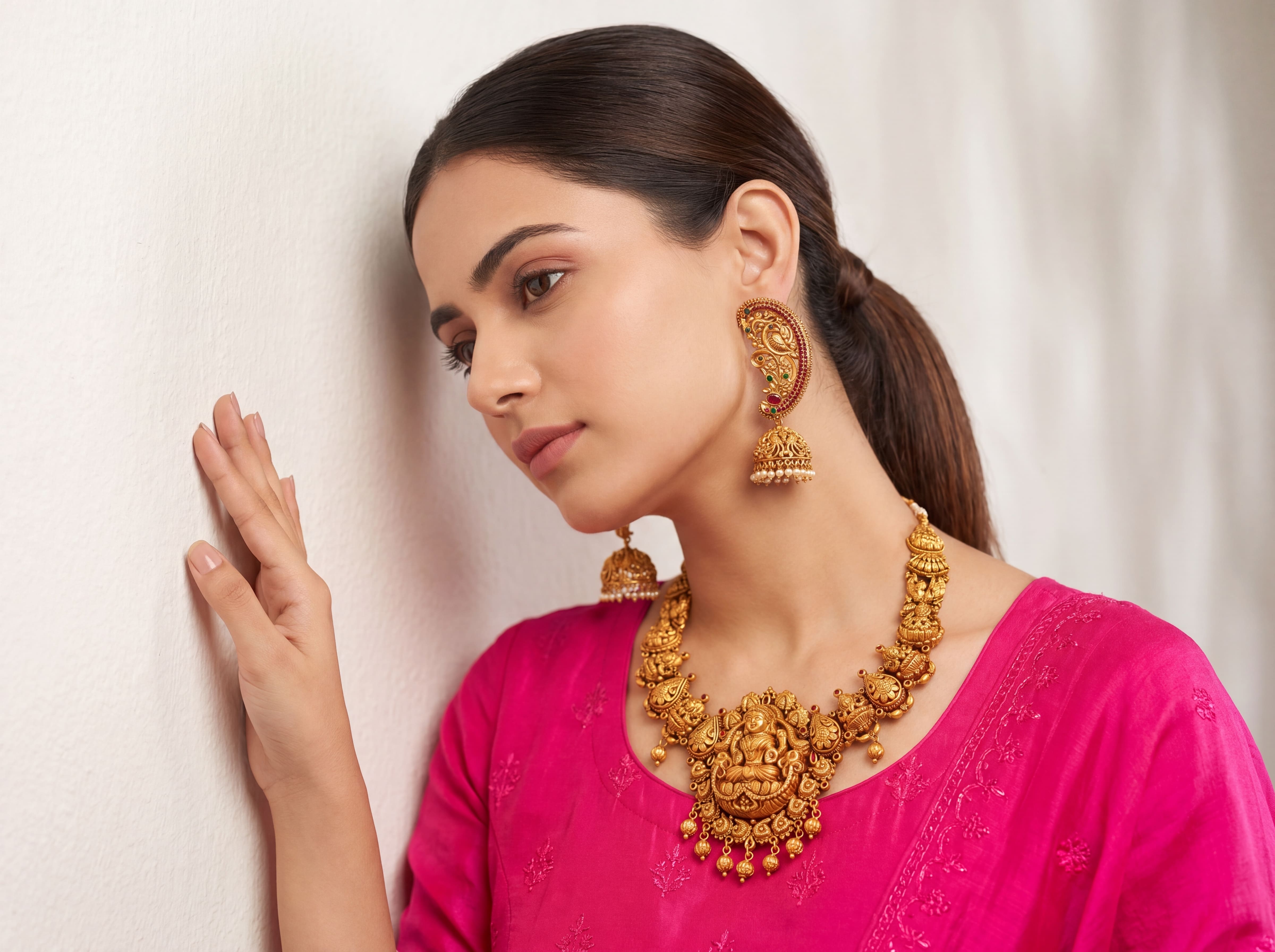 Model wearing the jewellery set with a bridal expression
